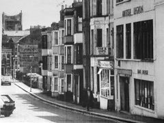 The-top-end-of-Station-Road-with-Haig-House-and-the-Chip-shop.-1976.